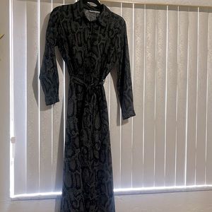 Long sleeved black snake skin patterned maxi dress